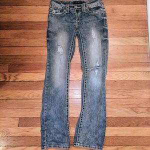 Distressed blingy bootcut jeans